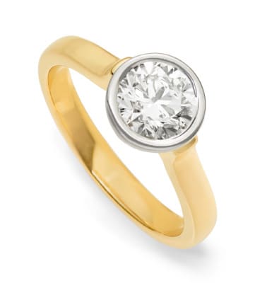 Floating diamond ring from The Brown Goldsmiths Signature Ring Collection