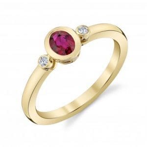 Oval Ruby and diamond petite bezels ring