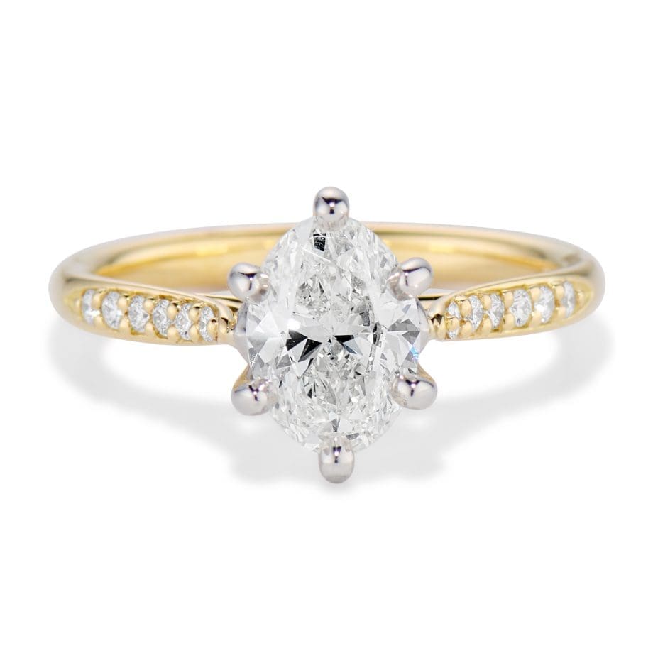 Jubilee Ring with Oval diamond center and diamond band from Brown Goldsmiths Signature Ring Collection