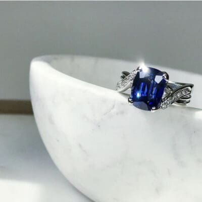 Cushion Cut Sapphire Custom cross over band