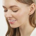 Seashell Stud earrings 14k yellow gold on model