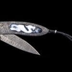 The Monarch Mist by William Henry B05 MIST inlaid with carved banded agate scales featuring a dragon.