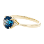 London Blue Topaz and Diamond Ring in 14k yellow gold. Side view.