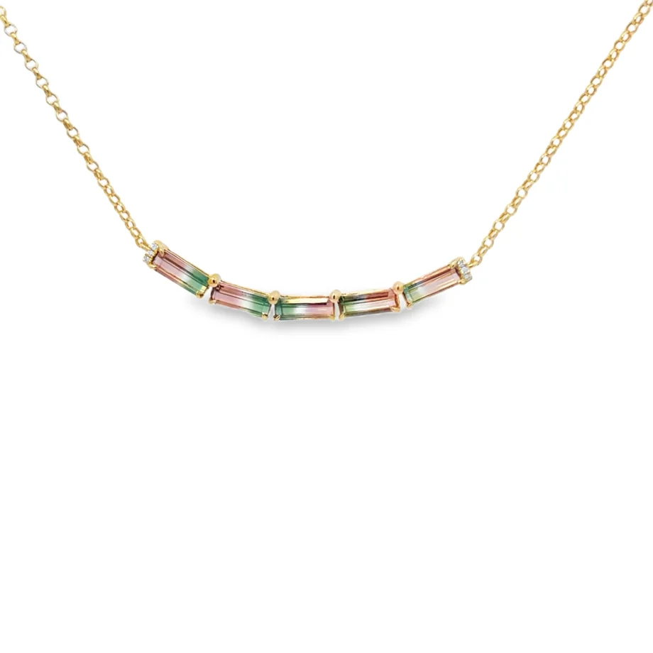 Watermelon tourmaline smile necklace in 14k yellow gold.