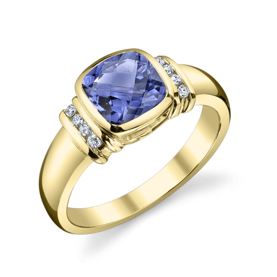 Tanzanite Cushion cut bezel set 14kt Yellow Gold Ring with Diamonds in a channel on either side of the center