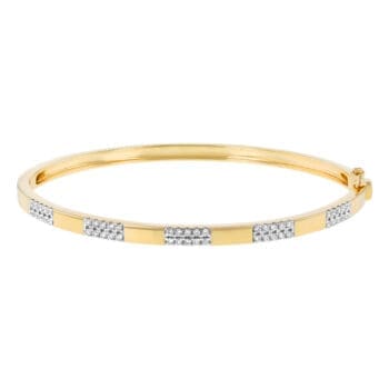 Alternating Pavé Diamond Hinged Bangle in 14k yellow gold.