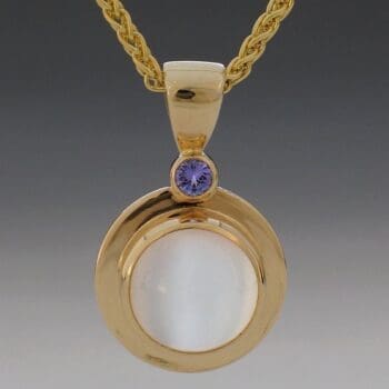 Cat's Eye Moonstone and Tanzanite Pendant in yellow gold
