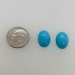 Turquoise Cabochons loose with dime for scale
