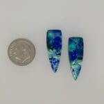 Azurite Malachite Cabochons loose with dime for scale.
