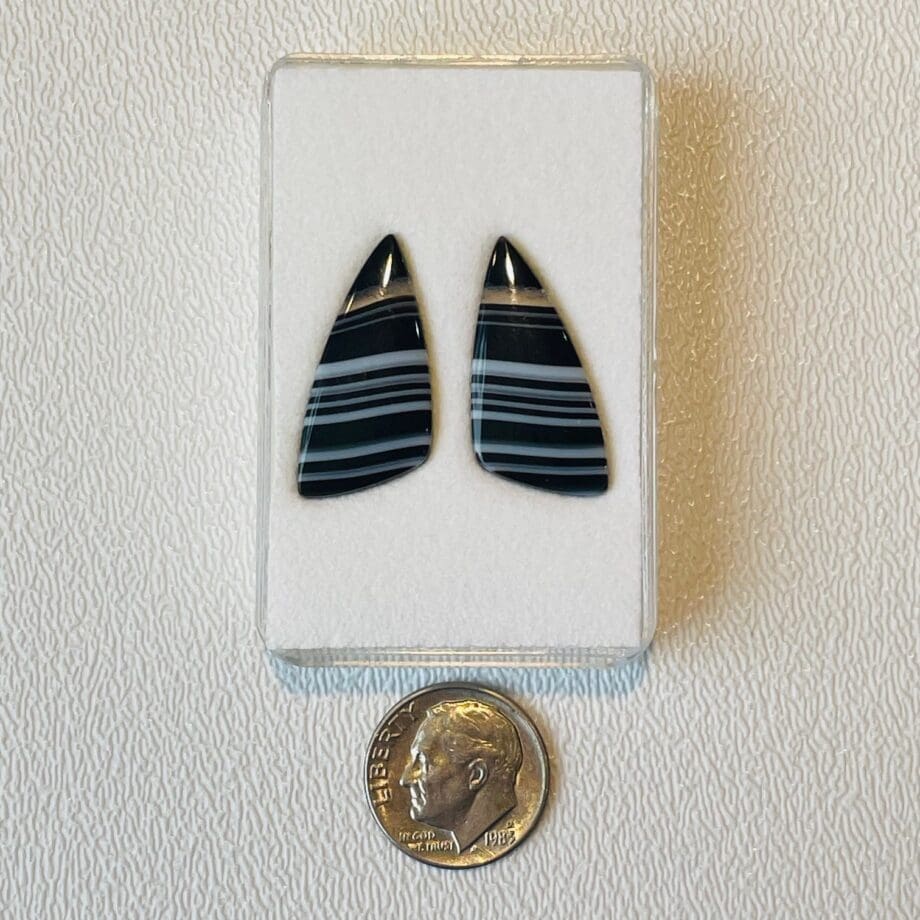 Matched Pair Tuxedo Agate, Sail Shaped Cabochons 270-1451 in box with dime for scale