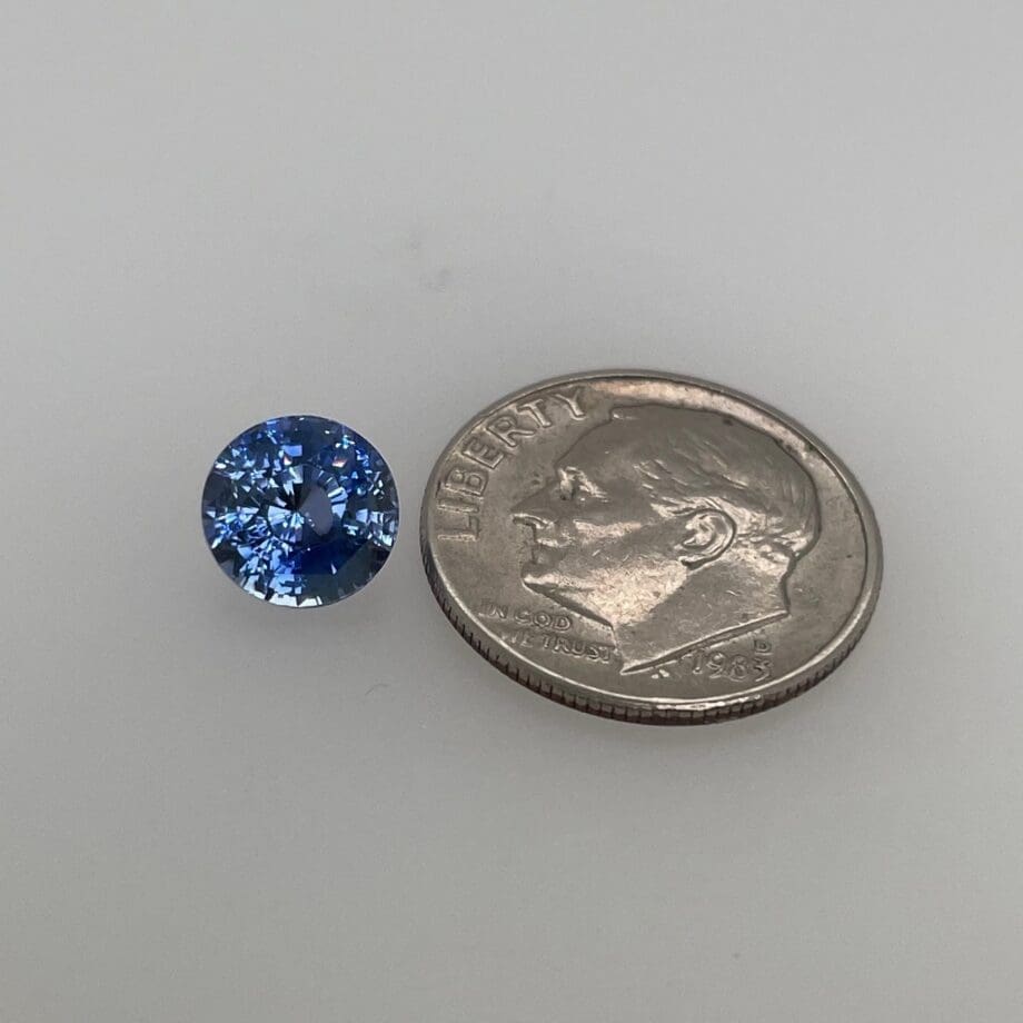 2.16ct Round Blue Sapphire 270-1221 loose with dime for scale