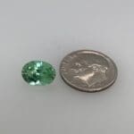 Green Maine Tourmaline loose with dime for scale