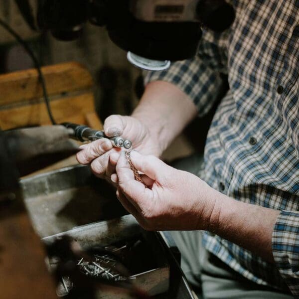 CodyJamesBarryPhotography_BrownGoldsmiths-278 Person making bracelet repair