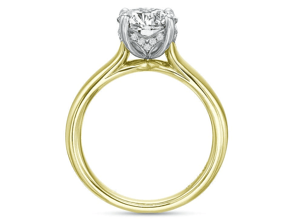 Modern solitaire ring with 1.50ct round diamond in 18K yellow gold and platinum setting