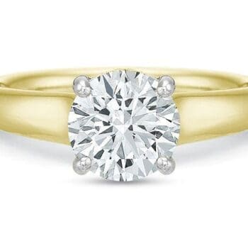 Round diamond solitaire engagement ring in 18K yellow gold band with platinum diamond setting