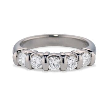 Platinum ring with five round diamonds set in a bar style, size 6.5