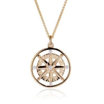 Compass Rose pendant in 14K yellow gold with five round diamonds set in a bead setting
