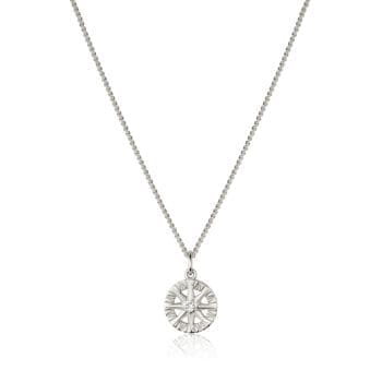 Compass Rose pendant in 14K white gold featuring a round center diamond