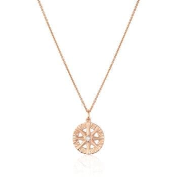 Compass Rose pendant with round diamond and side diamonds set in 14K rose gold