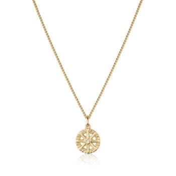Compass Rose pendant featuring a round diamond set in 14K yellow gold