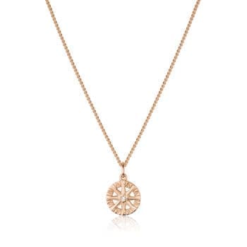 Compass Rose pendant in 14K rose gold with a round diamond center