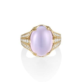 Purple chalcedony ring with oval diamond accents and filigree details in 14K yellow gold
