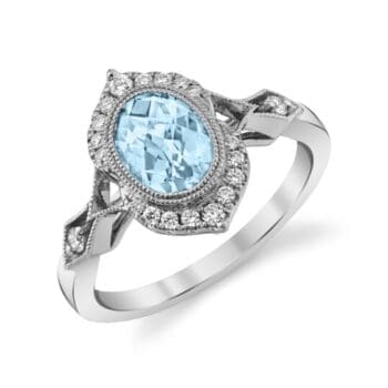 Aquamarine halo ring with light blue center gemstone and oval diamonds in 14K white gold