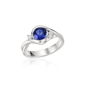 Petite Embrace Ring featuring a blue sapphire center gemstone with round diamonds set in platinum, size 6.5