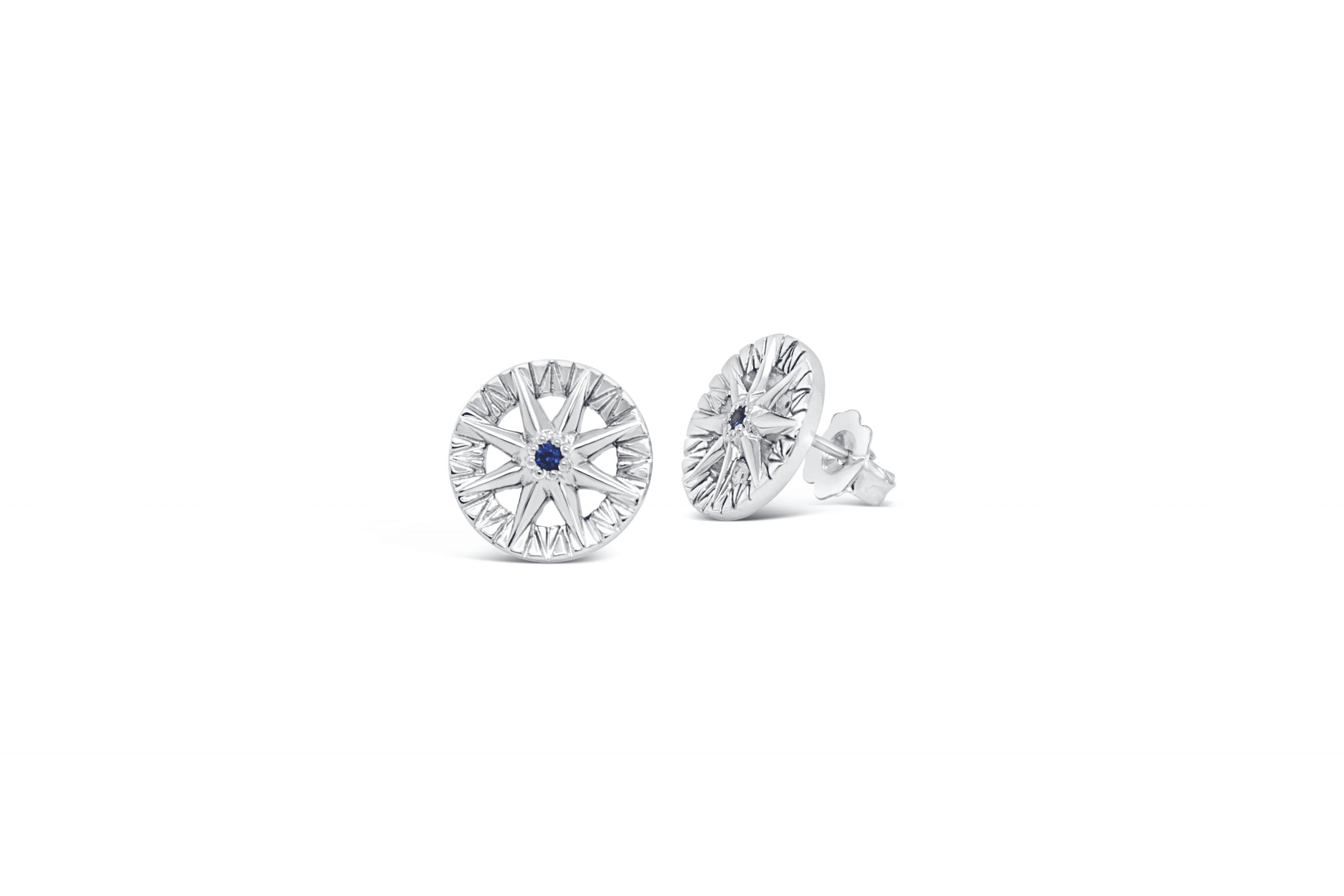 Compass Rose Sapphire stud earrings with blue sapphires set in 14K white gold