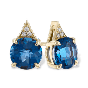 Blue topaz stud earrings in 14K yellow gold