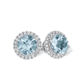 Aquamarine stud earrings with round diamond halos set in 14K white gold
