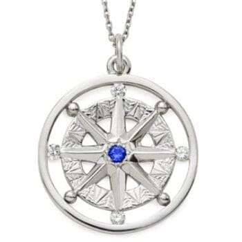 14K white gold Compass Rose pendant featuring a blue sapphire center and four round brilliant diamonds