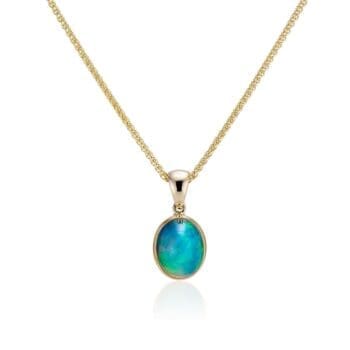 Drop pendant featuring a 14x9mm oval opal set in 14K yellow gold