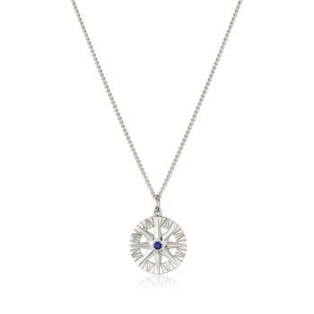 Compass Rose pendant with blue sapphire center and round diamonds in 14K white gold