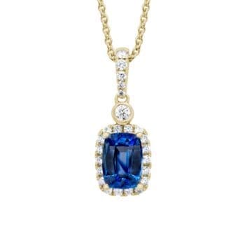 Blue sapphire pendant necklace in 14K yellow gold with elongated cushion-cut side gemstones