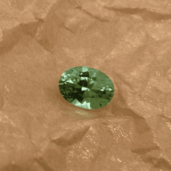 Oval mint green Maine tourmaline gemstone weighing 2.81 carats
