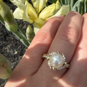 14K yellow gold ring with 5.44mm freshwater pearl center and seven diamond accents