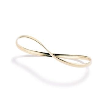Mobius Twist Bangle Bracelet crafted in 14K yellow gold with a prominent large centerpiece