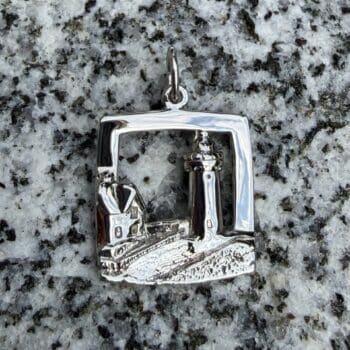 Sterling silver charm shaped like the Nubble Lighthouse