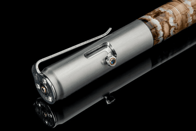 Bolt II Epic writing pen featuring fossil Woolly Mammoth tooth barrel and sapphire gemstone accents